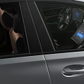 Silver Modern Sedan Car With Sleek Body Black Wheels And Taillights