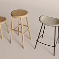 Three Modern Bar Stools Featuring Wooden And Upholstered Seats With Metal Legs