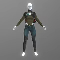 Model Wearing Green Long Sleeve Top With Blue Detail And Blue Jeans Against Gray Background