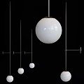 Modern Minimalist Wall Lamps With White Sphere Shades And Golden Brackets For Home Interior