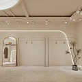 Modern Clothing Store Interior Featuring White Mannequins Dresses Beige Sofa Green Plants And Large Windows