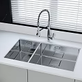 Stainless Steel Double Bowl Kitchen Sink With Flexible Faucet On White Countertop