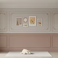 Classic Gray And Pink Paneled Background Wall With Decorative Molding Framed Art And Round Mirror