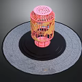 Pink Birdcage With Gold Decorative Patterns On Circular Black And Gray Mats