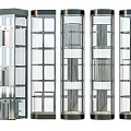Modern Elevators With Different Designs Featuring Glass Doors And Metal Frames