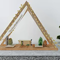 Triangular Wooden Tent With Decorative Elements Table Cushions Green Plants And Gray Gravel