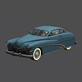 Vintage Blue Classic Car With Sleek Body Design And White Wall Tires