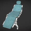 Adjustable Medical Examination Table With Green Padded Surface And Metal Support Frame