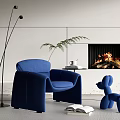 Modern Blue Single Sofa in Living Room with Fireplace Floor Lamp and Balloon Dog Decor