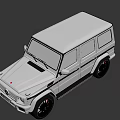 White Mercedes-Benz G-Class SUV With Black Wheels And Front Grille Design