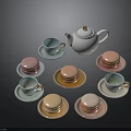 Colorful Macarons With White Teapot And Matching Teacups On Saucers For Afternoon Tea