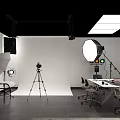 Professional Photography Studio Setup With Lighting Camera Tripod And Workspace