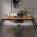 Modern Office Desk Setup With Laptop Table Lamp Flower Vase And Coffee Mug