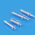 Medical Devices Multiple Syringes With Needles Arranged On Blue Background 3d model