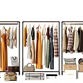 Fashionable Clothes Displayed on Racks with Bags Shoes and Luggage