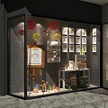 Small Creative Display Space Featuring Easel Artworks Decorative Balls And Shelf 3d model