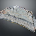 Artistic Sculpture Carving With Natural Stone Textured Surface Irregular Shape Grayish Blue Tones Rough Edges
