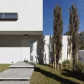 Modern White Detached Villa With Lush Trees Black Car And Stone Steps