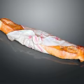 Fresh Crispy Baguette Wrapped in White Paper with Golden Crust