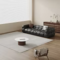 Modern Black Leather Large Sofa With Accent Pillows Round Coffee Table And Wooden Cabinet Decor