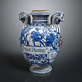Blue And White Decorative Vase With Lion Head Handles And Intricate Patterns