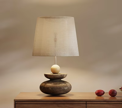 Wooden Base Table Lamp With Beige Lampshade And Two Red Fruits On Wooden Table 3d model