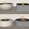 Modern Fireplaces In Concrete Shapes With Burning Flames And Black Pebbles