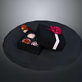 Open Black Gift Box With White Ribbon Pink Bow And Small Items On Circular Platform