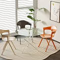 Modern Round Glass Table and Chair Set With Three Different Colored Chairs By Window 3d model