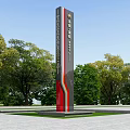 Tall Spiritual Fortress Column With Red And Gray Sections In Plaza Surrounded By Green Trees