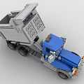 Building Blocks Dump Truck Toy With Blue Cab Gray Bed And Wheels