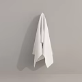 White Towel Hanging with Neat Fold on Gray Wall in Simple Home Decor