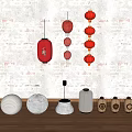 Traditional Red and White Chinese Lanterns Hanging on Textured Wall with Decorative Wooden Bases