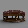Round Brown Tufted Ottoman with Decorative Wooden Base and Buttoned Upholstery