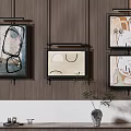 Abstract Paintings Hanging on Wooden Wall with Decorative Frames and Vase Accent