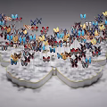 Colorful Butterfly Art Installation With White Base And Wing Shaped Design