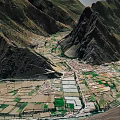Scenic Rural Valley Landscape With Mountain Ranges Farmlands Village And River