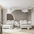 Modern Kids Room Interior With Cloud Shaped Decor Soft Seating Stuffed Toys And Round Rug