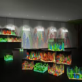 Colorful Aquariums On Display Shelves With Wave Patterned Background And Hanging Lights