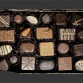 Assorted Chocolate Gift Box With Various Shapes Flavors And Decorative Toppings