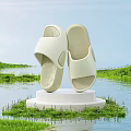 White Slippers Placed on White Pedestal Surrounded by Green Grass and Calm Water