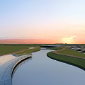 Scenic Park Landscape at Sunset with Curved River Green Lawns Bridge and Parked Cars