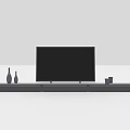 Sleek Modern TV Stand With Flat Screen TV Black Speakers Decorative Vases And Small Cup