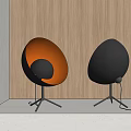 Modern Egg Shaped Table Lamps Orange Black and Black with Tripod Base on Wooden Wall