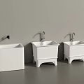 Three White Bathroom Sinks with Different Designs and Silver Faucets Against Gray Wall