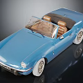 Vintage Blue Convertible Car with Brown Seats Black Top and White Wheels Retro Design