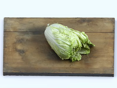 Fresh Chinese cabbage placed on wooden cutting board in bright white background 3d model