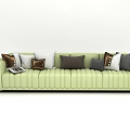 Light Green Sectional Sofa With Multiple Colored Cushions And Magazine On Top 3d model