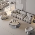 Plush Beige Modern Sofa and Round Coffee Table Set with Accent Chair and Plants