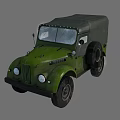 Vintage Green Military Truck with Canvas Top Round Headlights and Grille Design